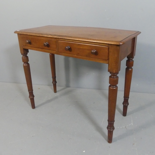 2200 - A Victorian mahogany writing table, with two frieze drawers and raised on turned legs. Width 90cm, h... 