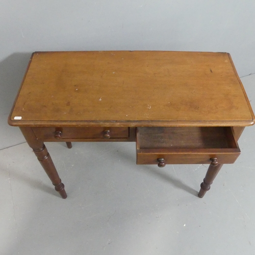 2200 - A Victorian mahogany writing table, with two frieze drawers and raised on turned legs. Width 90cm, h... 