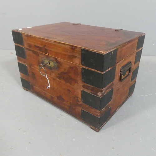 2208 - A stained pine and metal bound chest, with label for Burne. Width 46cm, height 28cm, depth 33cm.... 