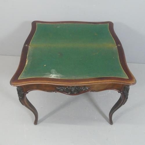 2209 - A 19th century Rosewood fold-over card table, with applied carved decoration and raised on cabriole ... 