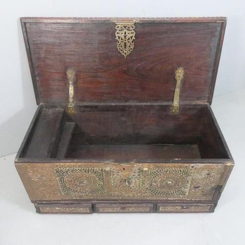 2218 - A 19th century Zanzibar trader's chest of hardwood construction, with copper and studded brass decor... 