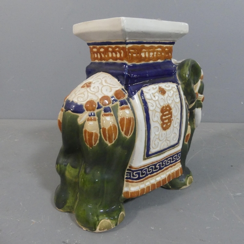 2219 - A painted ceramic elephant design garden seat. Height 38cm.