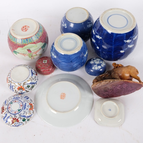 125 - A Chinese blue and white porcelain prunus pattern ginger jars, a soapstone water buffalo, 13cm, etc