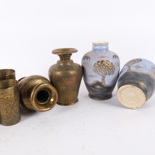 126 - A group of Middle Eastern engraved brass items, including pair of vases, beakers, etc