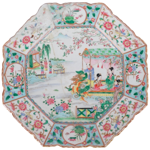 131 - A Chinese octagonal porcelain charger, depicting figures and a water dragon, width 44cm, A/F