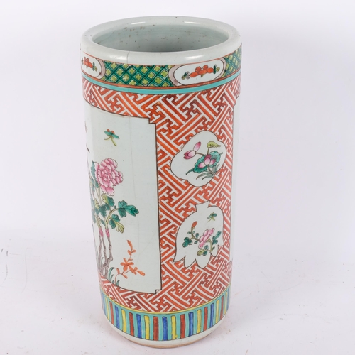 135 - A Chinese famille vert ceramic barrel stick stand, 45cm