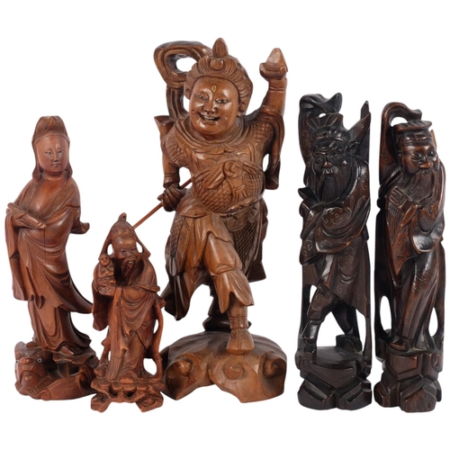 138 - A group of Chinese carved wood deity figures, largest 34cm (5)