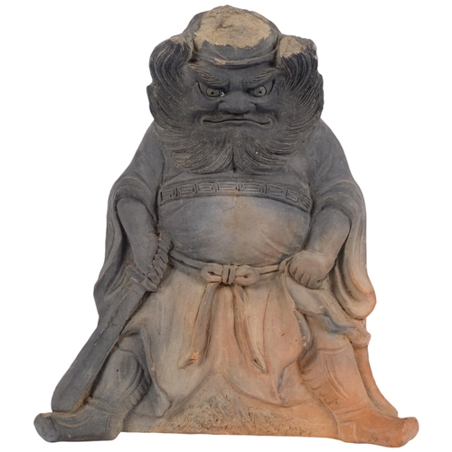 143 - A large Japanese pottery 'Shoki' Onigawara roof tile, 39cm