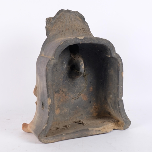 143 - A large Japanese pottery 'Shoki' Onigawara roof tile, 39cm