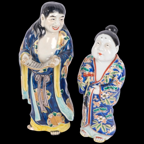144 - 2 Japanese polychrome glaze pottery figures, including example holding a scroll, 30cm (2)