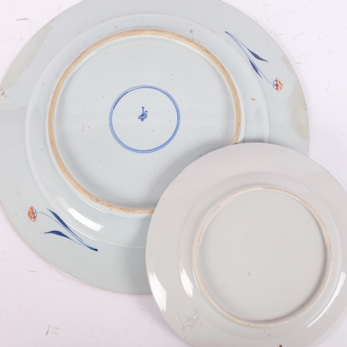 145 - A Chinese red blue and gilt decorated porcelain plate, diameter 39cm, and a Japanese blue ground pla... 