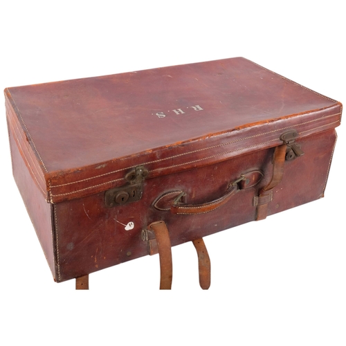 151 - An Antique leather-covered travelling suitcase marked RHS, W71cm