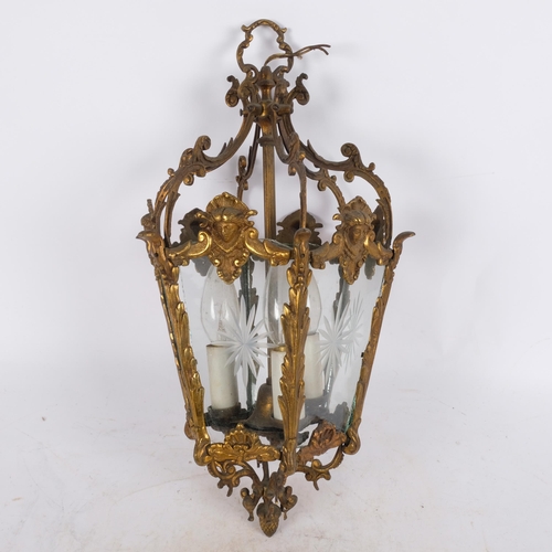 19 - A French gilt-brass ceiling pendant lantern, with fitted etched glass panels and acorn finial, H46cm