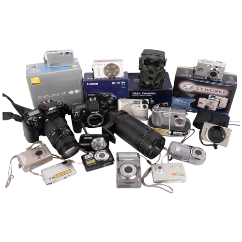 199 - A quantity of boxed and other digital cameras, including a Canon Powershot SX610HS, Nikon Coolpix S1... 