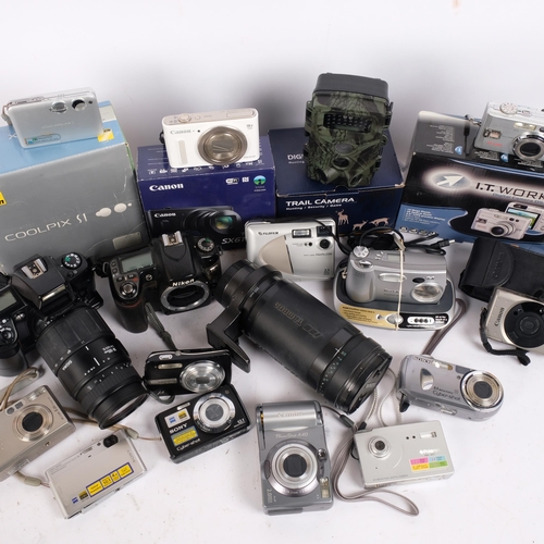 199 - A quantity of boxed and other digital cameras, including a Canon Powershot SX610HS, Nikon Coolpix S1... 