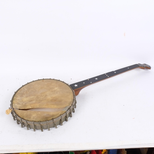 203 - An Italian banjo (A/F), L94cm