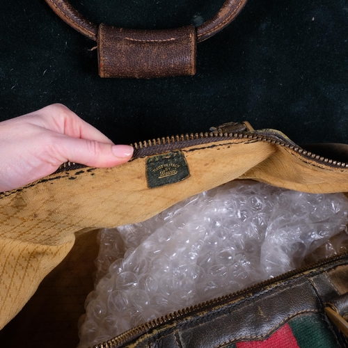 205 - GUCCI - 2 Vintage Gucci travel cases, including an olive leather holdall, with a small leather label... 