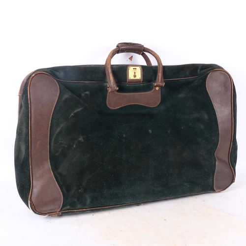 205 - GUCCI - 2 Vintage Gucci travel cases, including an olive leather holdall, with a small leather label... 