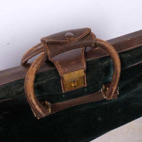 205 - GUCCI - 2 Vintage Gucci travel cases, including an olive leather holdall, with a small leather label... 