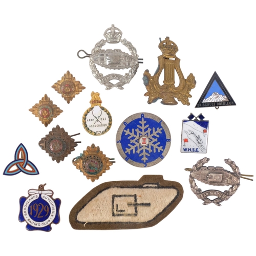 307 - Various military cap badges and pin brooches, including Tank Regiment cloth badge