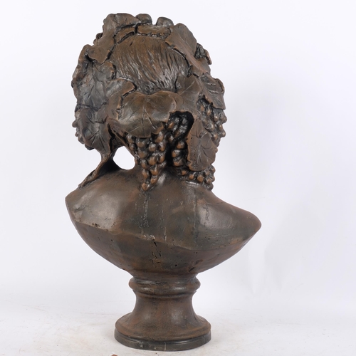 66 - A life-size cast-iron but of a woman, bronze patination, overall height 60cm