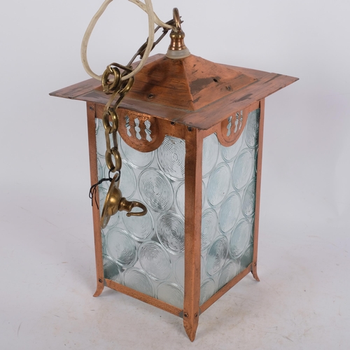 7 - An Arts and Crafts copper ceiling lantern, with original moulded glass panels, H40cm, W23cm