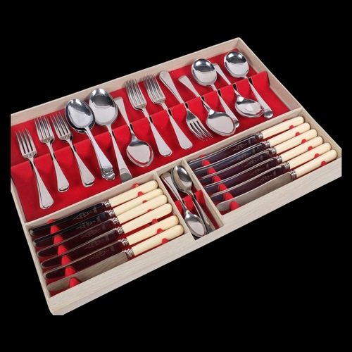 548 - A matched set of silver plated and stainless steel Old English pattern cutlery