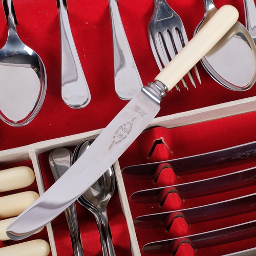 548 - A matched set of silver plated and stainless steel Old English pattern cutlery