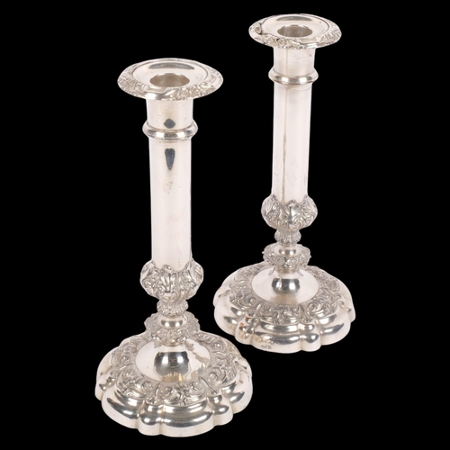 551 - A pair of Old Sheffield silver plate table candlesticks, 23cm