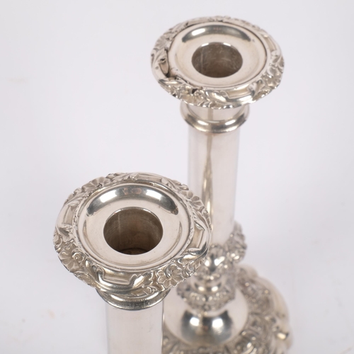 551 - A pair of Old Sheffield silver plate table candlesticks, 23cm