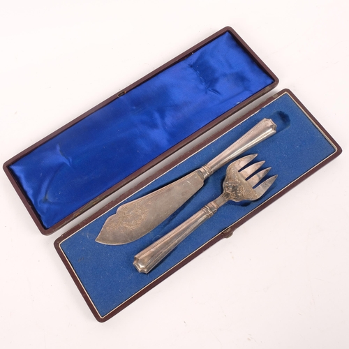 559 - A cased set of silver plated fish serving cutlery, knife 27.5cm