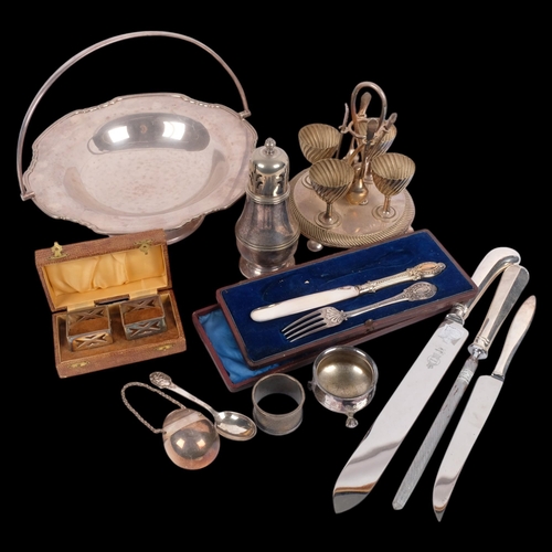 562 - Various silver plate, including egg cup holder and stand, cased pair of Arts and Crafts square napki... 