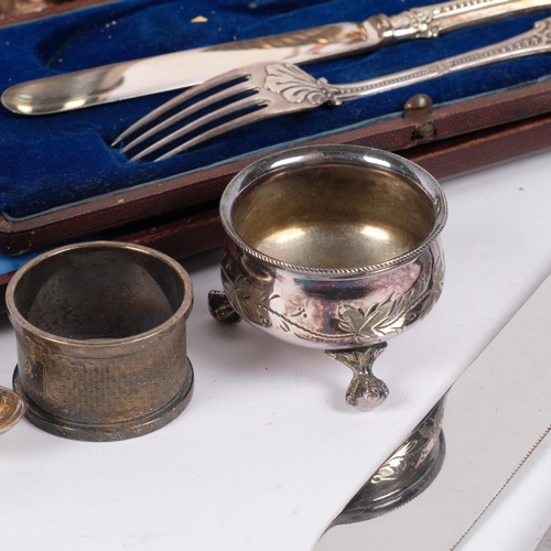 562 - Various silver plate, including egg cup holder and stand, cased pair of Arts and Crafts square napki... 