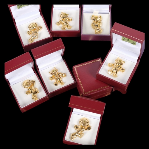 569 - A large quantity of Charles Edwards gold plated pin badges