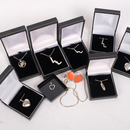 591 - 8 silver pendant necklaces, including heart and locket examples