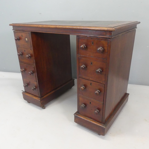 2338 - A Victorian mahogany pedestal desk, with inlaid tooled leather skiver and eight drawers. Width 92cm,... 