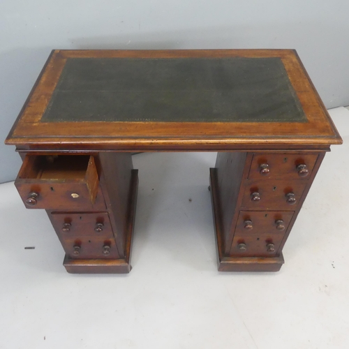 2338 - A Victorian mahogany pedestal desk, with inlaid tooled leather skiver and eight drawers. Width 92cm,... 