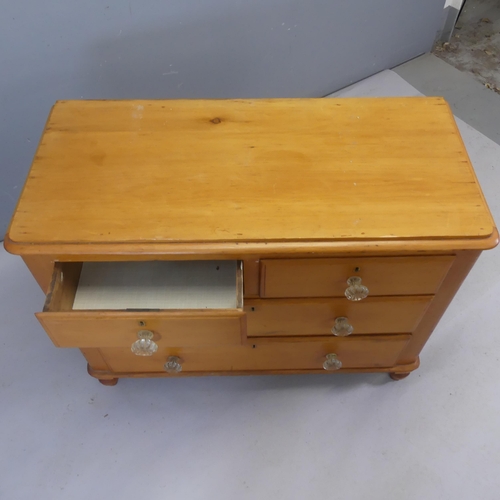 2339 - A vintage pine chest of two short and two long drawers. Width 102cm, height 78cm, depth 50cm.