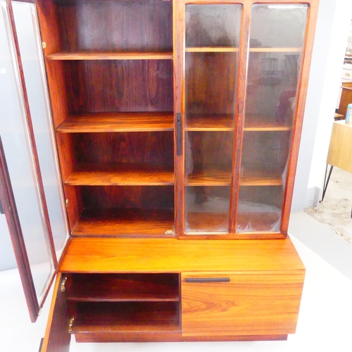 2408 - KOFOD LARSEN for Faarup Mobelfabrik, Denmark - A 1960s/70s rosewood display cabinet, with makers lab... 