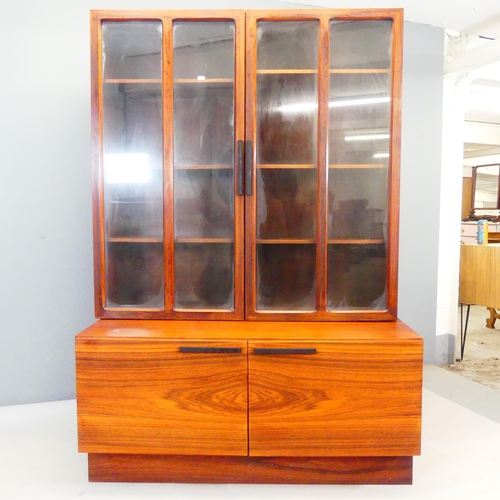 2409 - KOFOD LARSEN for Faarup Mobelfabrik, Denmark - A 1960s/70s rosewood display cabinet, with makers lab... 