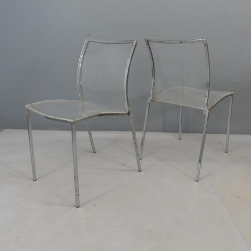 2435 - A set of six modern perspex stacking chairs on metal frames.