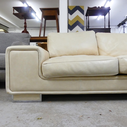 2504 - CASA NOVA - A contemporary Italian white leather upholstered sofa with makers label. Overall length ... 