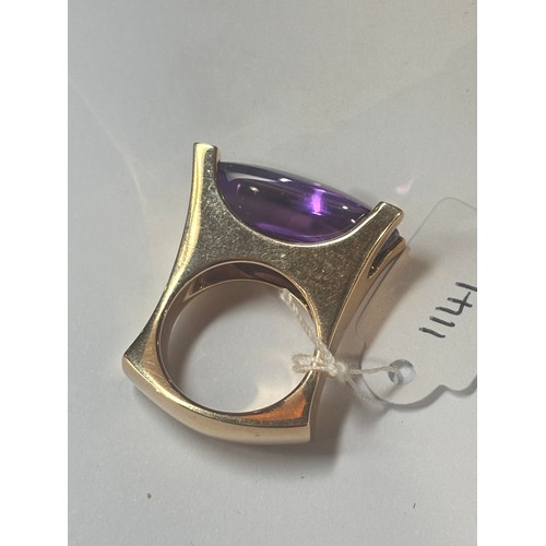 1141 - VAN CLEEF & ARPELS - an 18ct gold amethyst and diamond ring, geometric design set with a 25ct oval d... 