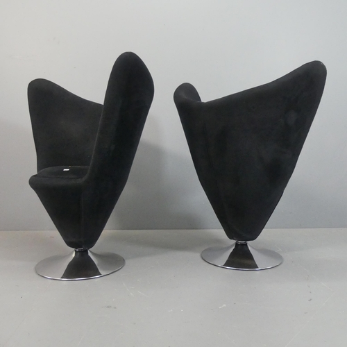 2509 - A pair of heart cone design swivel lounge chairs in the manner of Verner Panton.