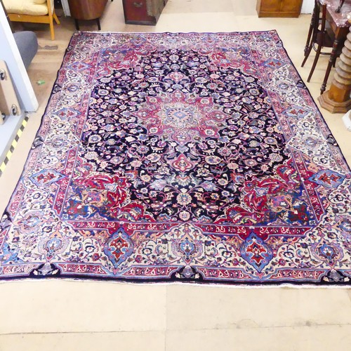 2508 - A large antique blue and red-ground Tabriz carpet. Length 385cm, width 300cm.