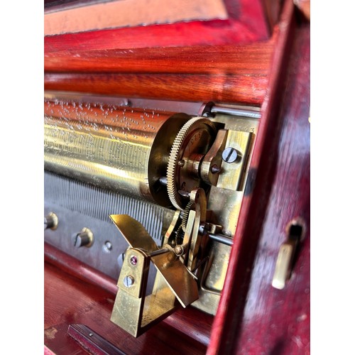 53 - A Swiss 19th century musical box, rosewood and marquetry inlaid case, playing 4 airs on a 21cm cylin... 