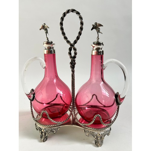 10 - A Victorian silver plated cranberry glass 2-decanter set on stand, by Roberts & Belk, stand height 2... 