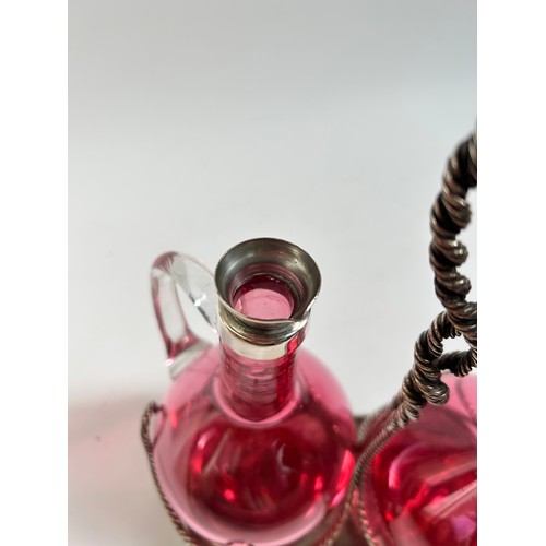 10 - A Victorian silver plated cranberry glass 2-decanter set on stand, by Roberts & Belk, stand height 2... 