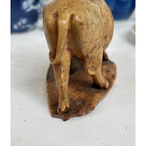 125 - A Chinese blue and white porcelain prunus pattern ginger jars, a soapstone water buffalo, 13cm, etc