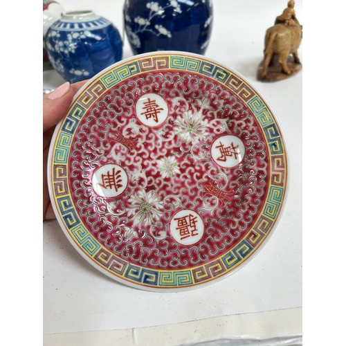 125 - A Chinese blue and white porcelain prunus pattern ginger jars, a soapstone water buffalo, 13cm, etc